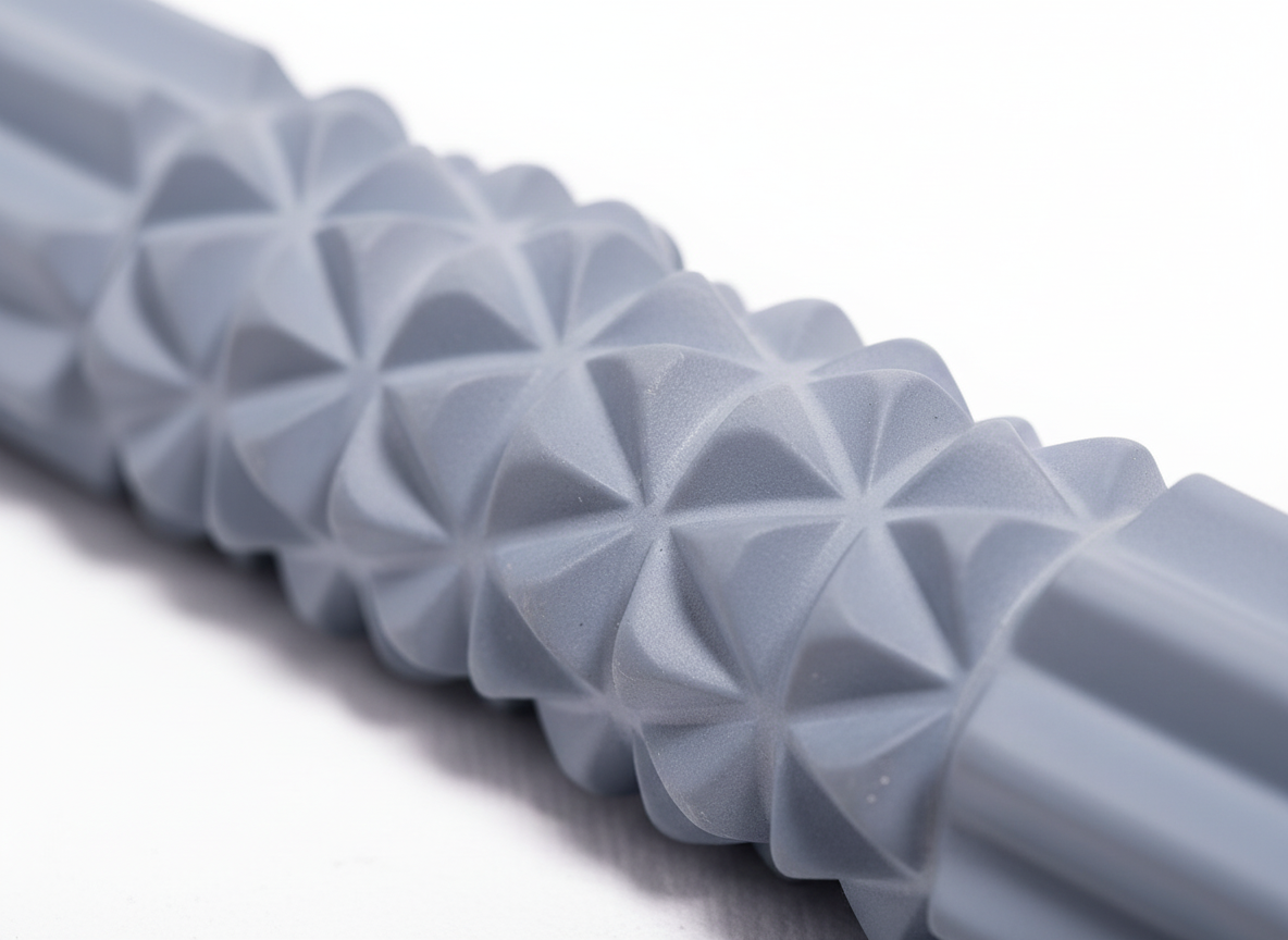 Gray textured roller on a white background